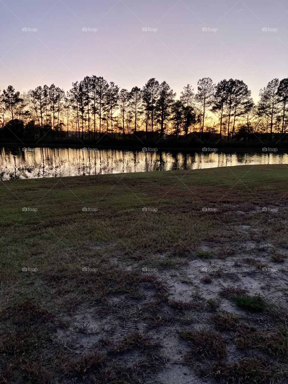 Sunset by water