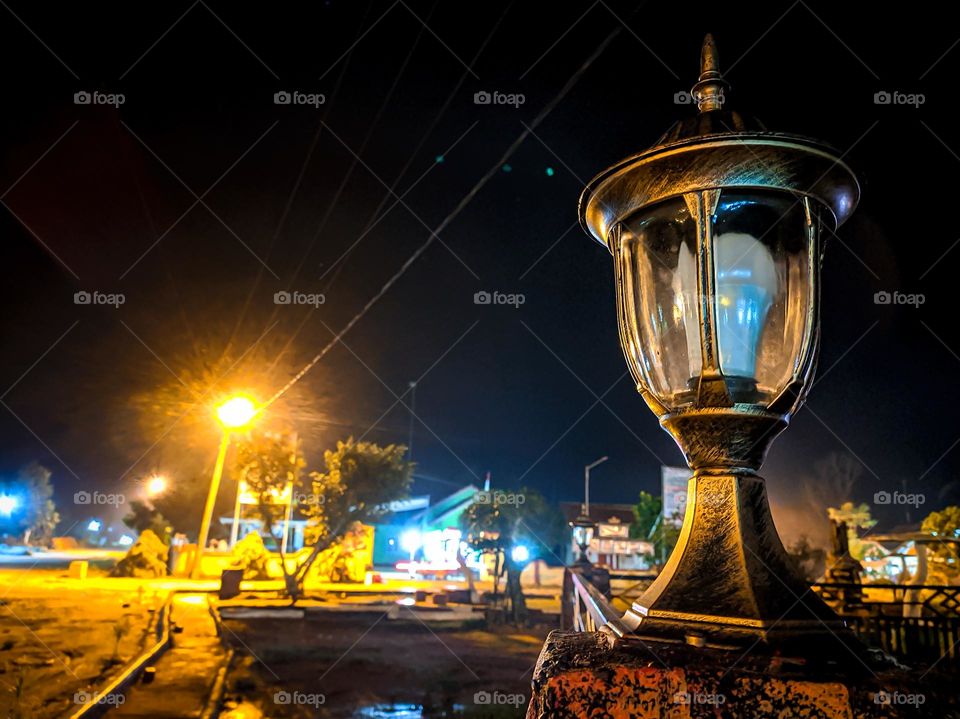 night light in the corner of the city