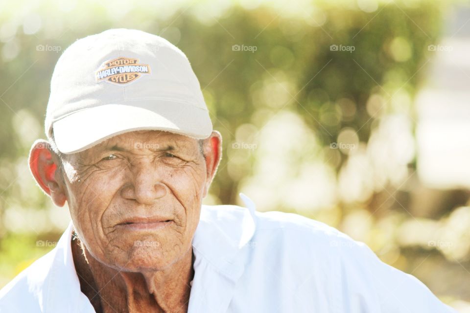 Harley Davidson . This man was sitting in the park in El Viejo reading 