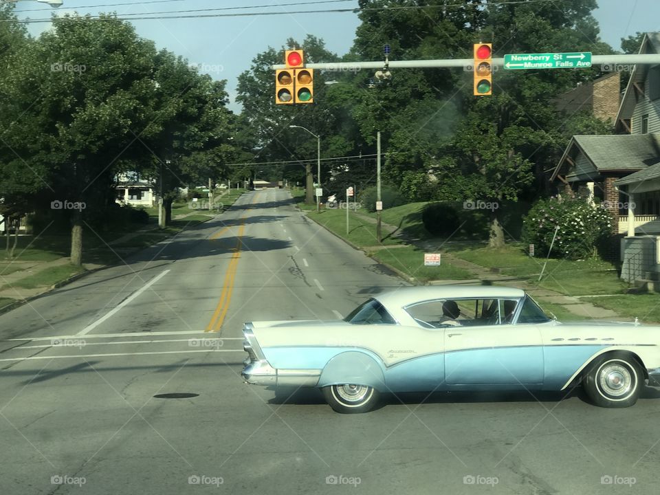 A classic person driving a classic car. Slightly abstract in the suburbs of Ohio, this photo will definitely please many. Every day is a vacation when you’re doing what you love!