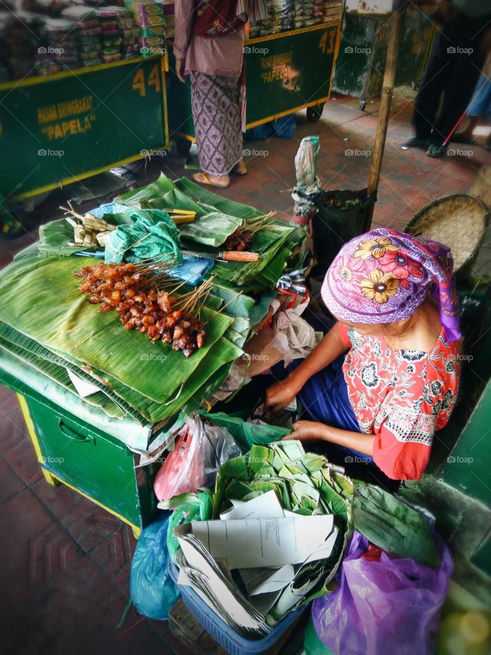 hard working women selling traditional foods in Jogjakarta
