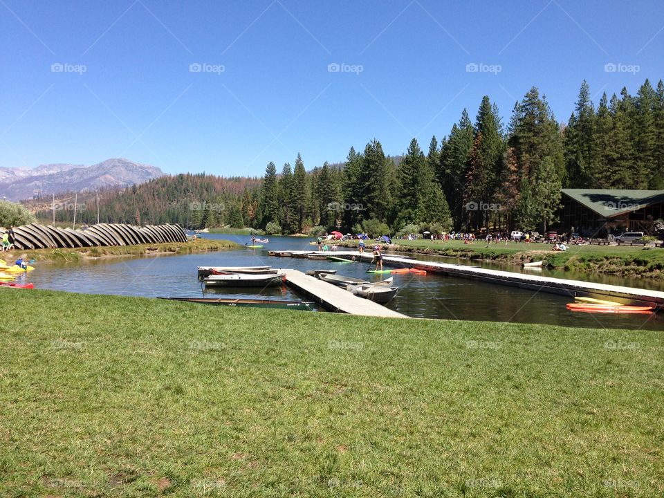 Lake with dock and kayaks