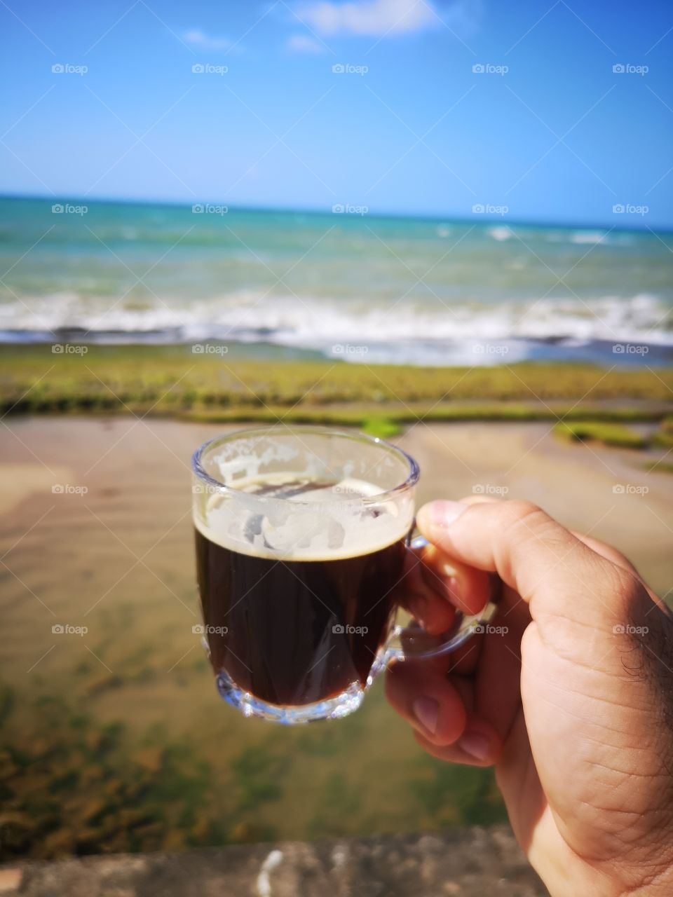 Dia começa com cafe e mar