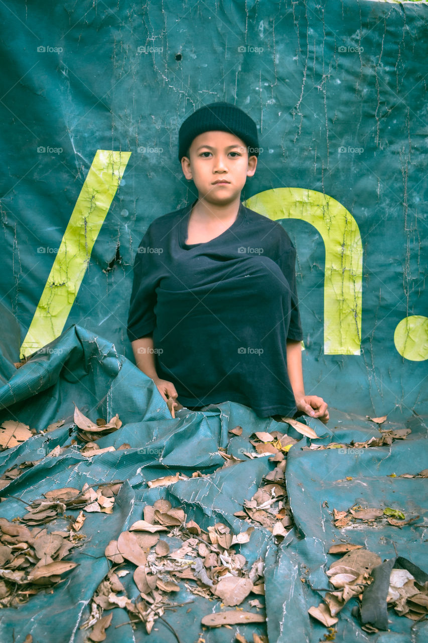 Portrait of a boy with an artist mood