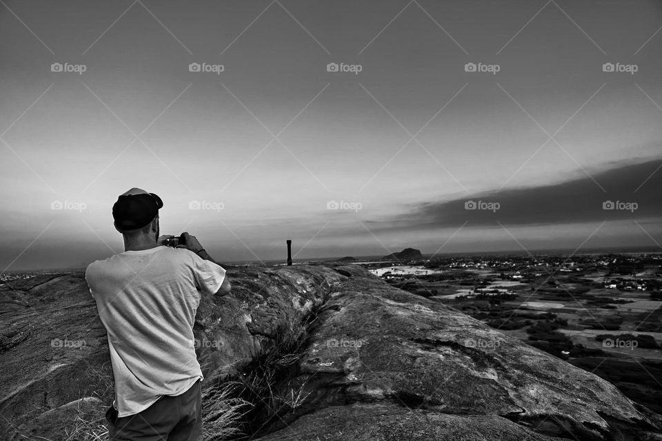 Taking photographs of a stupa and Mother Nature 