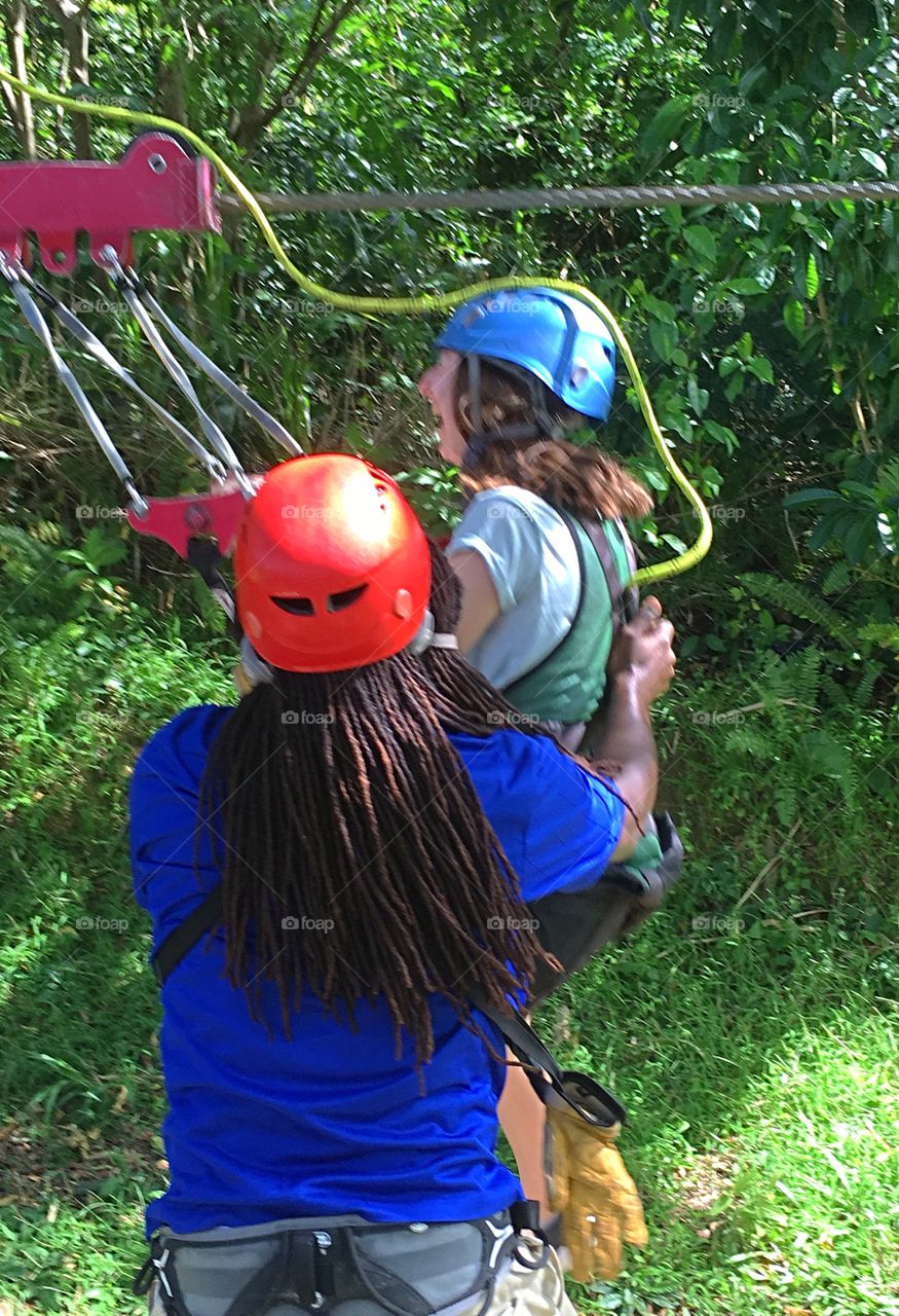 Coming to a screeching halt - action shot at the bottom of a zip line.  She came in fast!! 