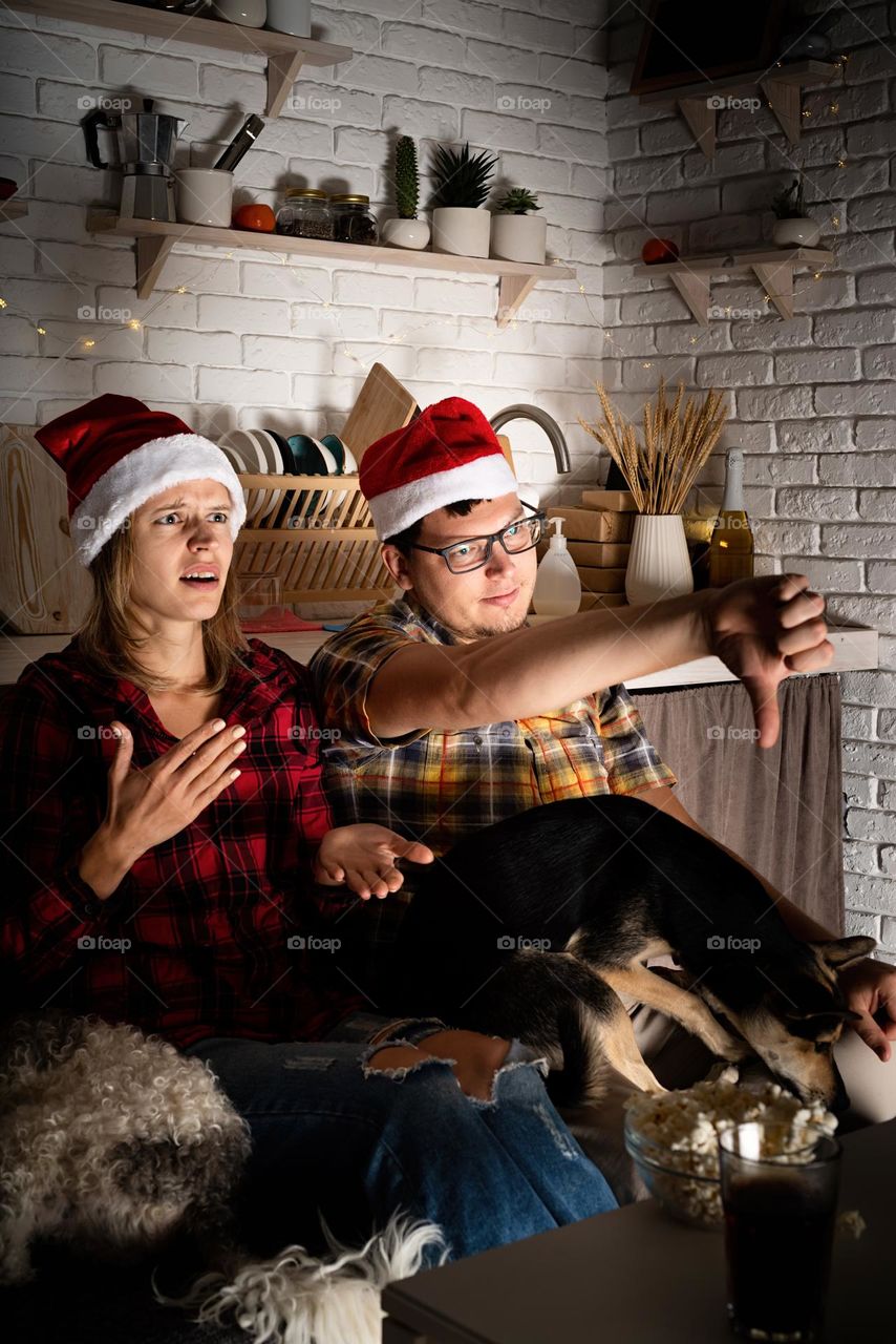 couple watching movies at home