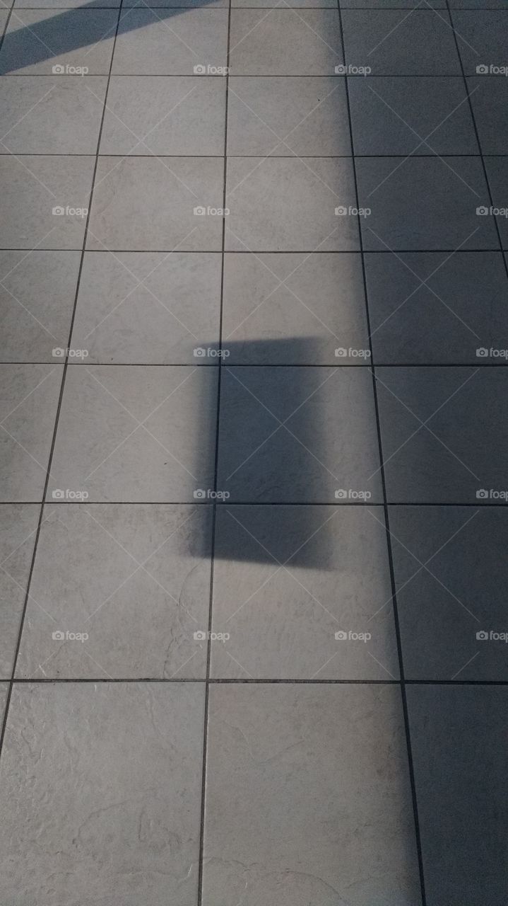 light and shadows from a window at the mall