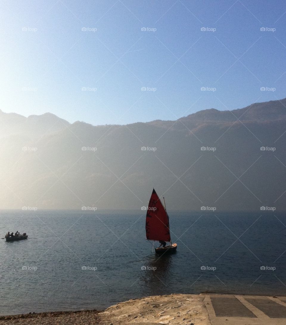 Old boat on lake in French Alps