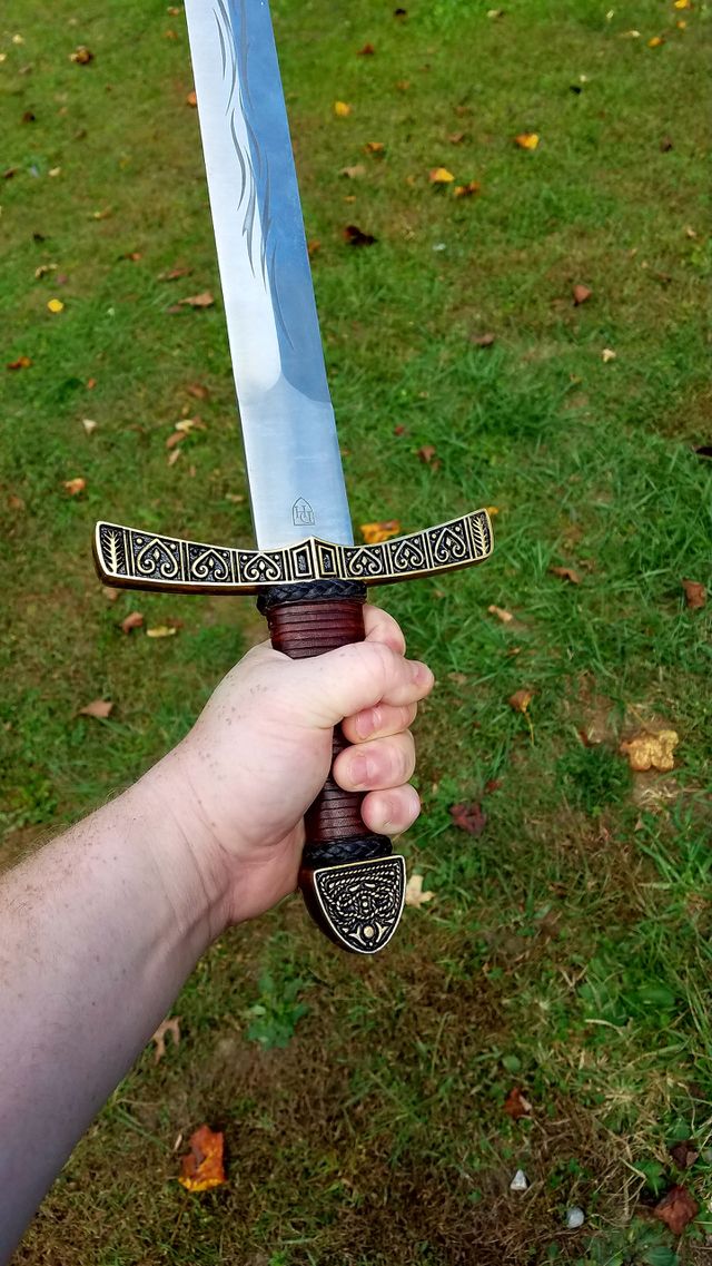 holding sword