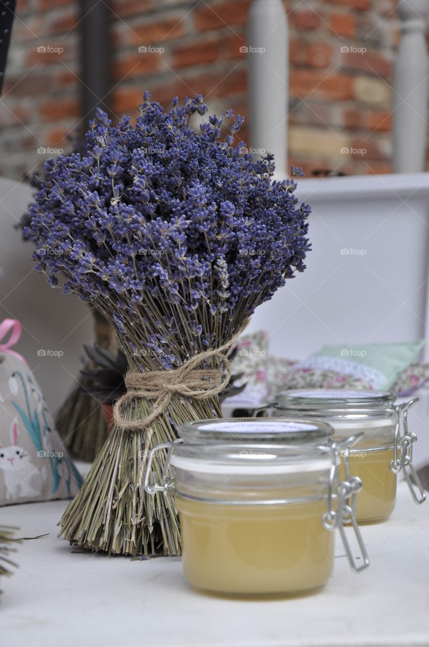 A bouquet of dry lavender and a jar of honey