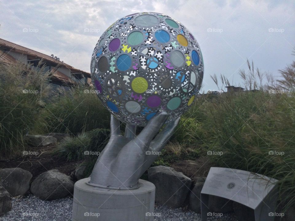 Sculpture of a Human Hand Holding a Ball