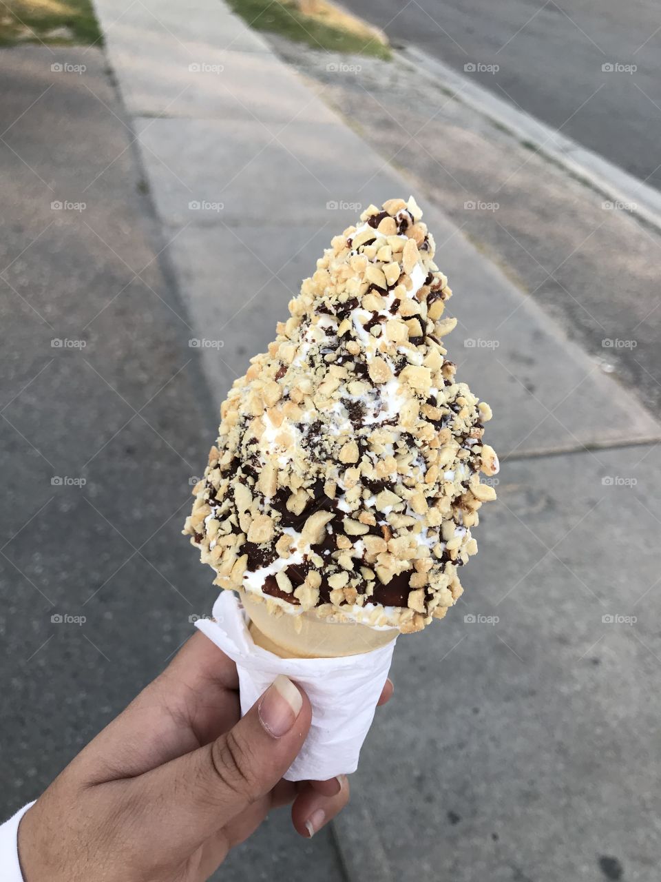 Vanilla cone dipped in Chocolate and Peanuts 😍