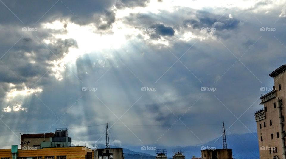 The crepuscular rays in the morning, that was suprised and sacred to me. it rayed
all over the land,  a quiet, peaceful, warm feelings.