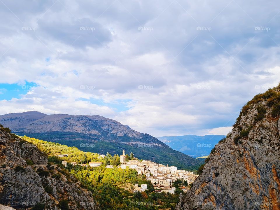 view of Villalago (Abruzzo, Italy) nestled between the mountains