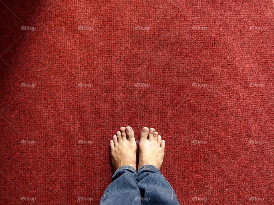 bare feet on red carpet