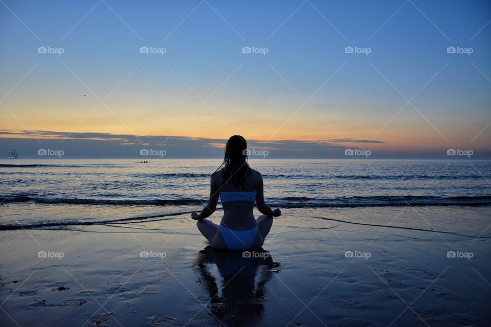 Outdoor yoga on the beach