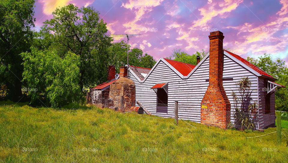 Sunset Over The Old Cottage