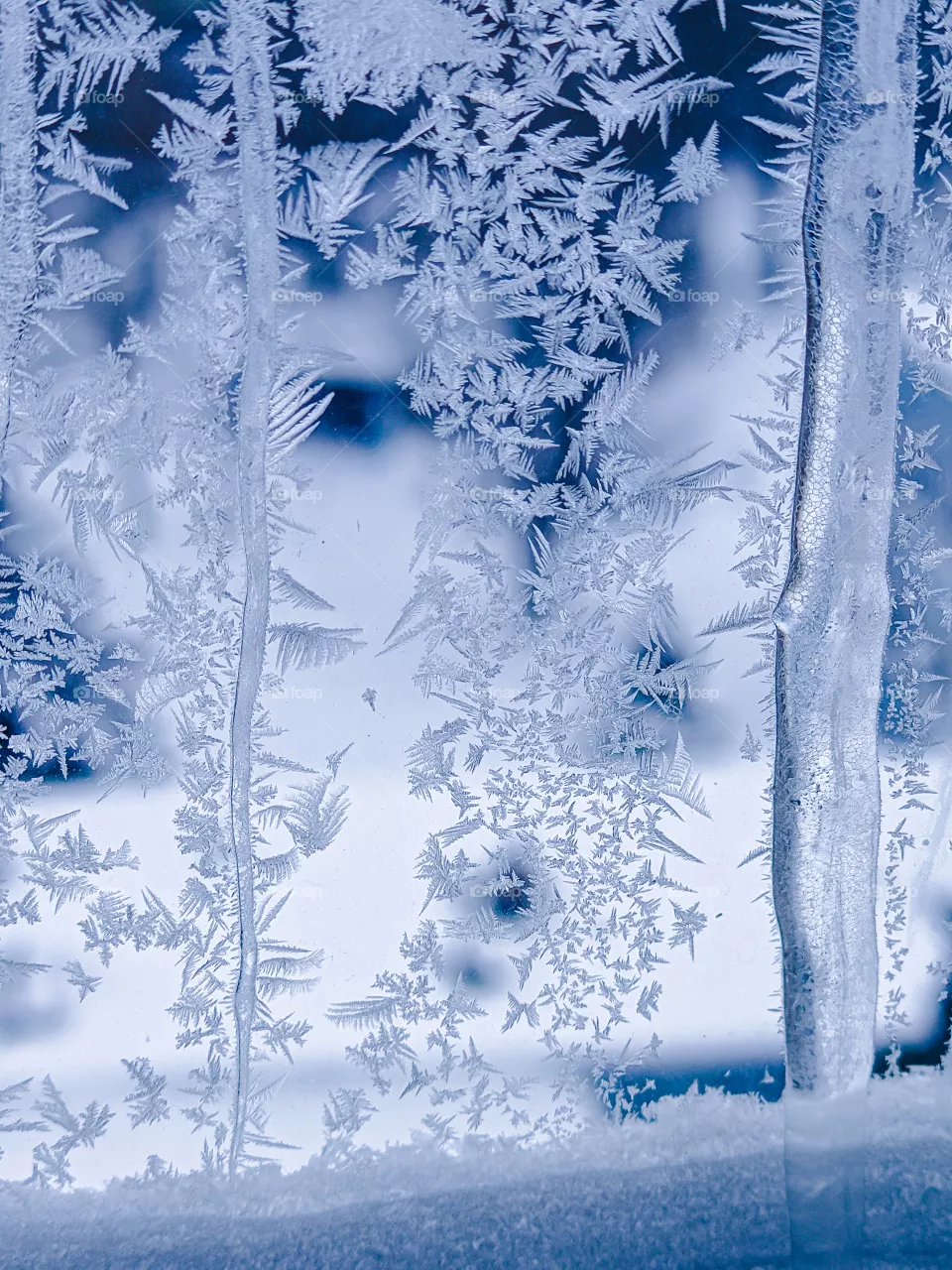 Frost pattern on the window pane.