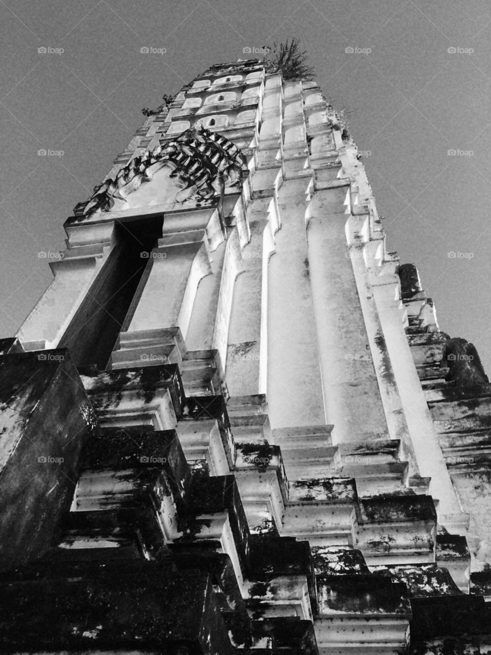 Black and white picture of one of the temples in Thailand where its unique symmetrical  structure and design captured you attention. 