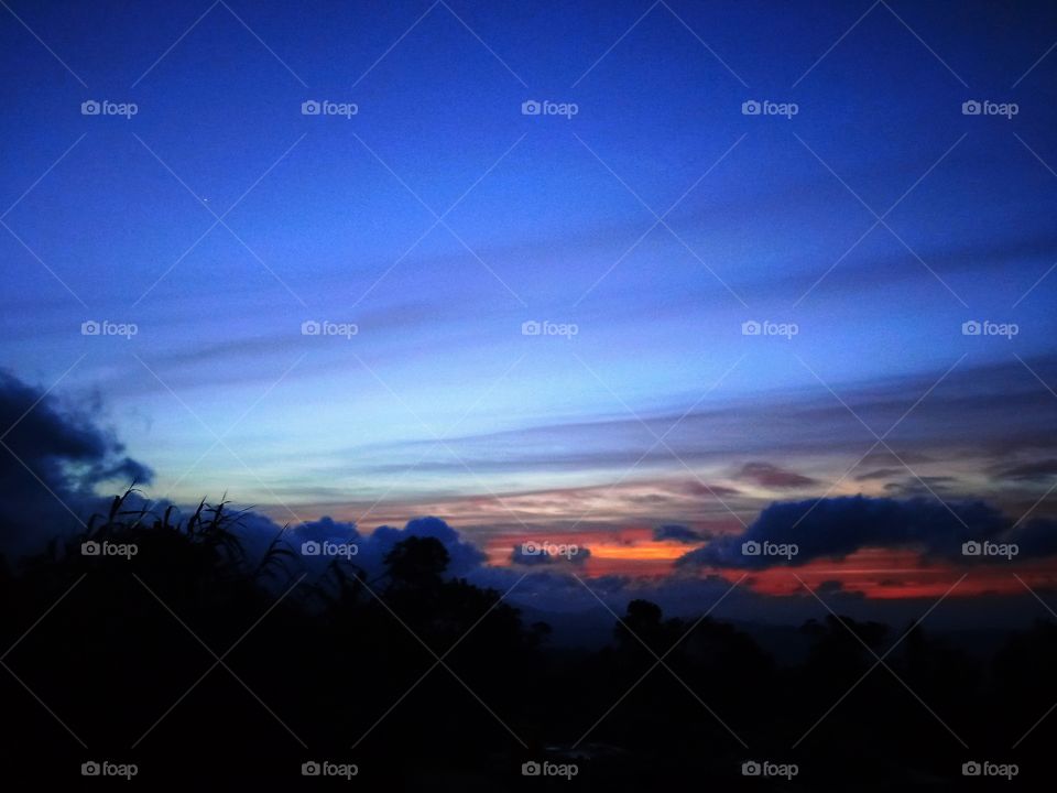 The beauty of the evening sky through the clouds.