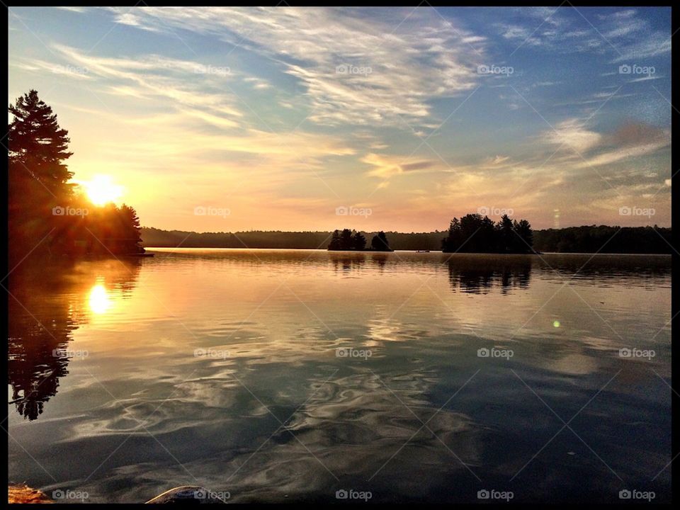 Sunrise over water. Lake. 