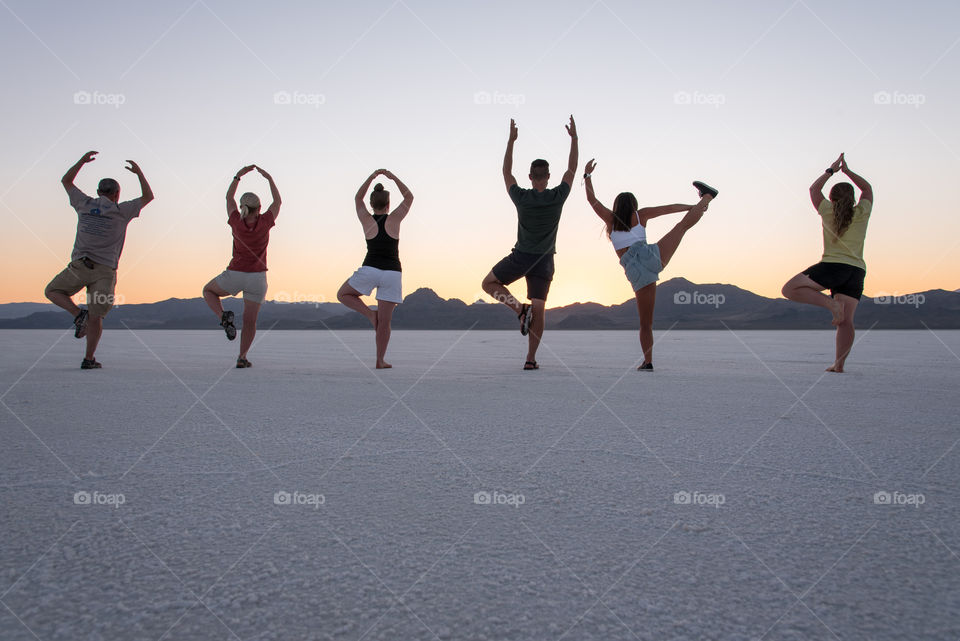 A yoga session on the salt flats with the whole family