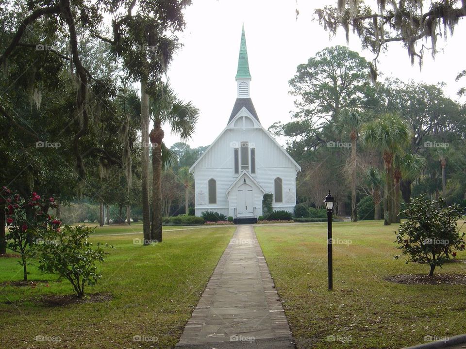 White church chapel in the trees