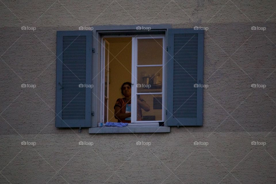 Neighbour Looking Through Opened Window