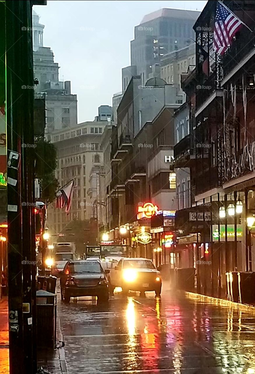 Downtown New Orleans traffic in the early morning rain