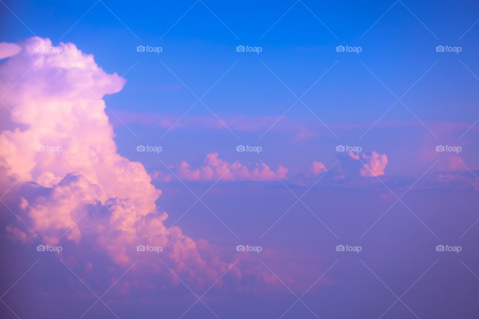 Capturing from an airplane through triple-pane windows can be quite challenging, but I’ve done all the hard work! When you fly through the clouds at sunset and Mother Nature paints the sky in a perfect combination of purple and pink,  sometimes gazing out the window is a lot better than staring at my smartphone for hours on board. 
So says the guy that’s typing this on a phone📱😂