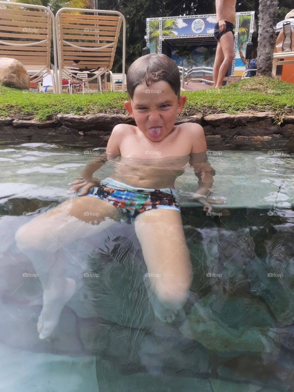 child with tongue out