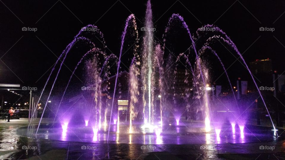 purple lights in a fountain
