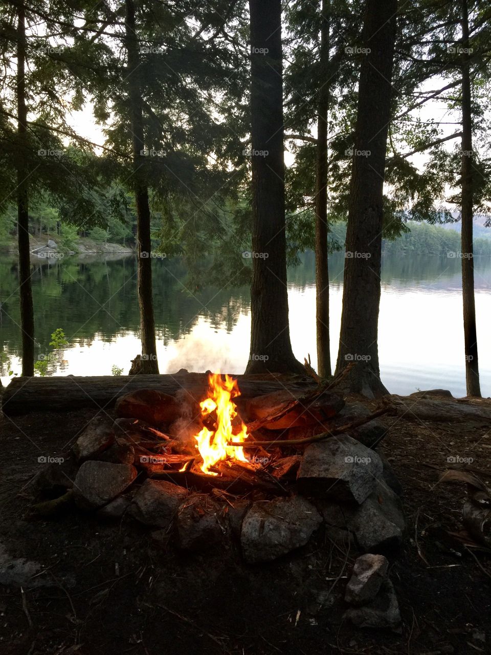 Quiet camp fire on Pharaoh Lake in the Adirondacks. You can hear the calls of Blue Herons in the background.