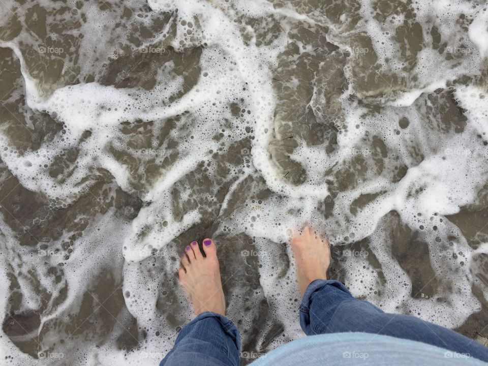 Feet in the surf