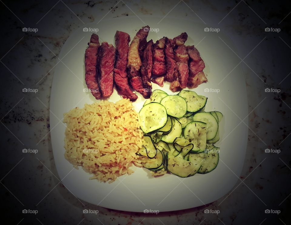 Delicious Steak Dinner With Squash and Rice