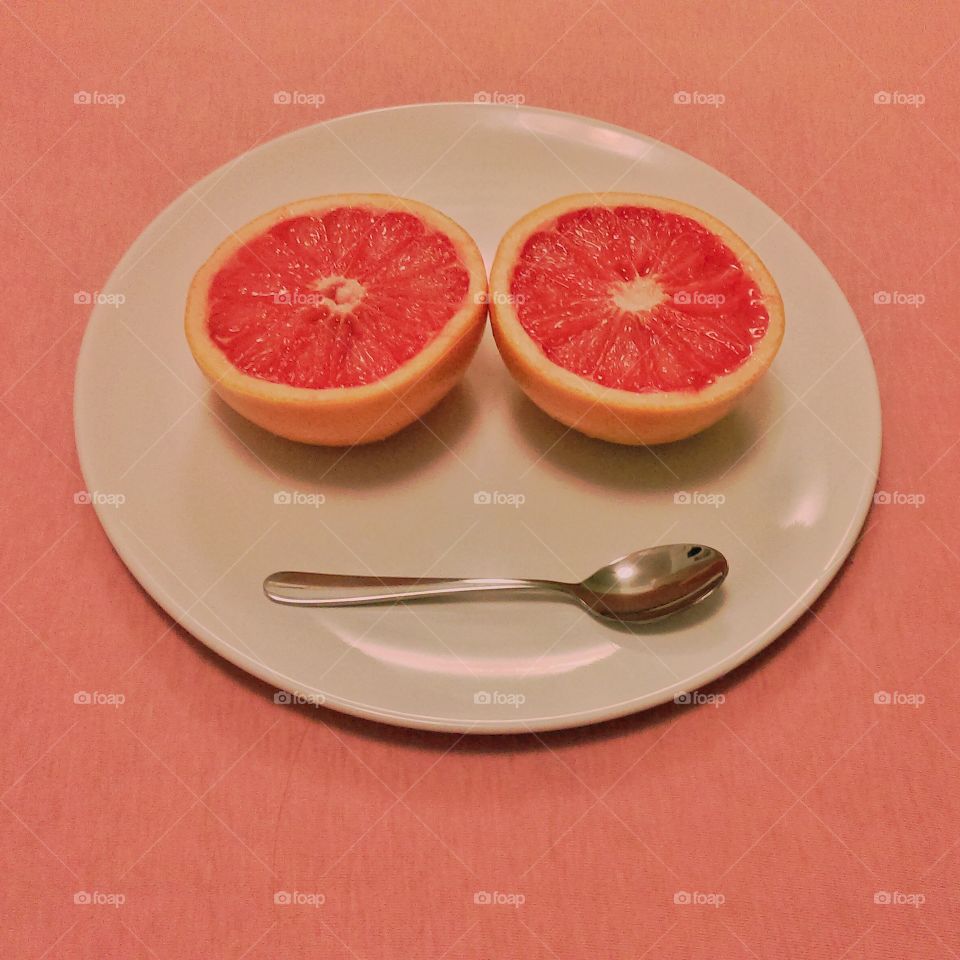 Grapefruit. Happy and pink
