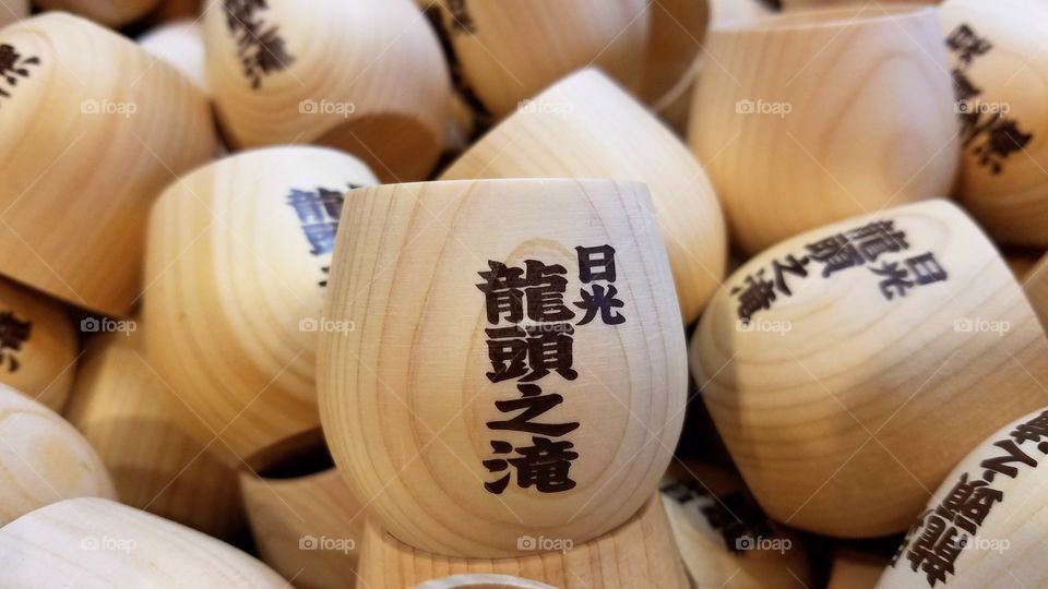Wood carved sake cups