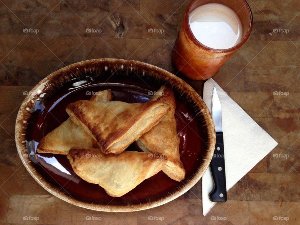 Raspberry turnovers served hot with a cold glass of milk🥐🥛