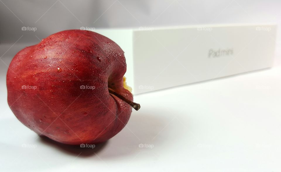 red apple with ipad mini white studio
