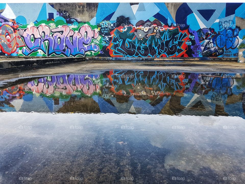 urban playground, colorful vivid street art graffiti reflection