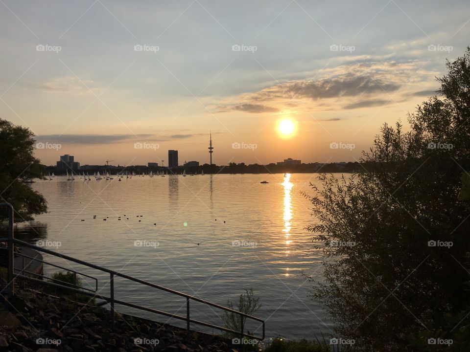 Sunset over the lake in Hamburg. Romantic view.