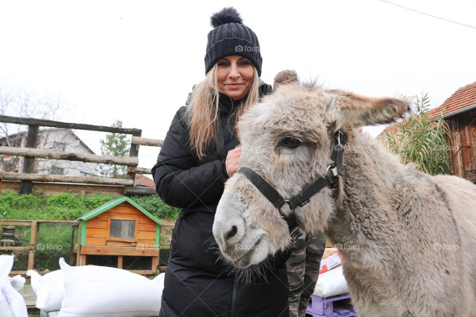 Woman and donkey