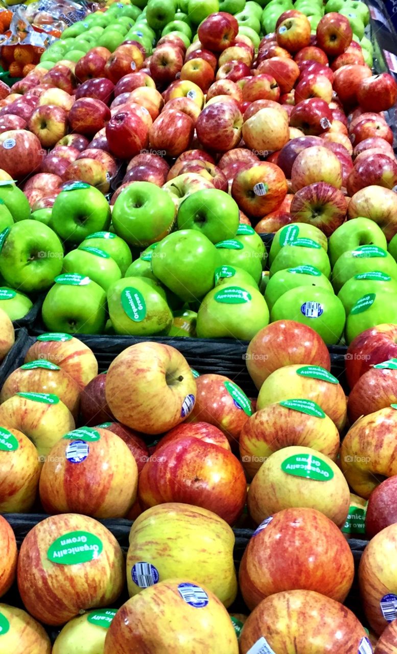 Variety of fresh apples in store