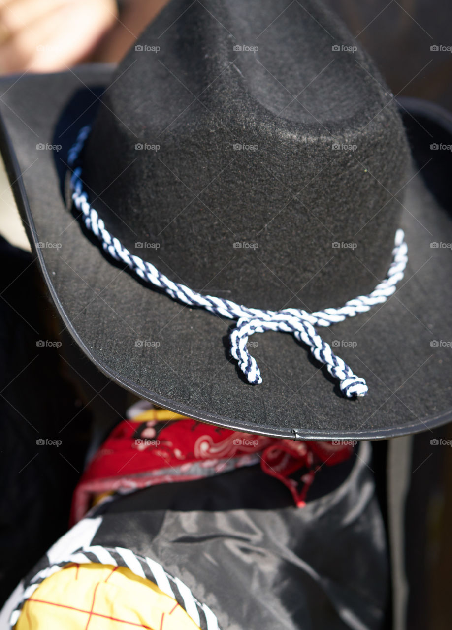 Rear view of a man wearing hat