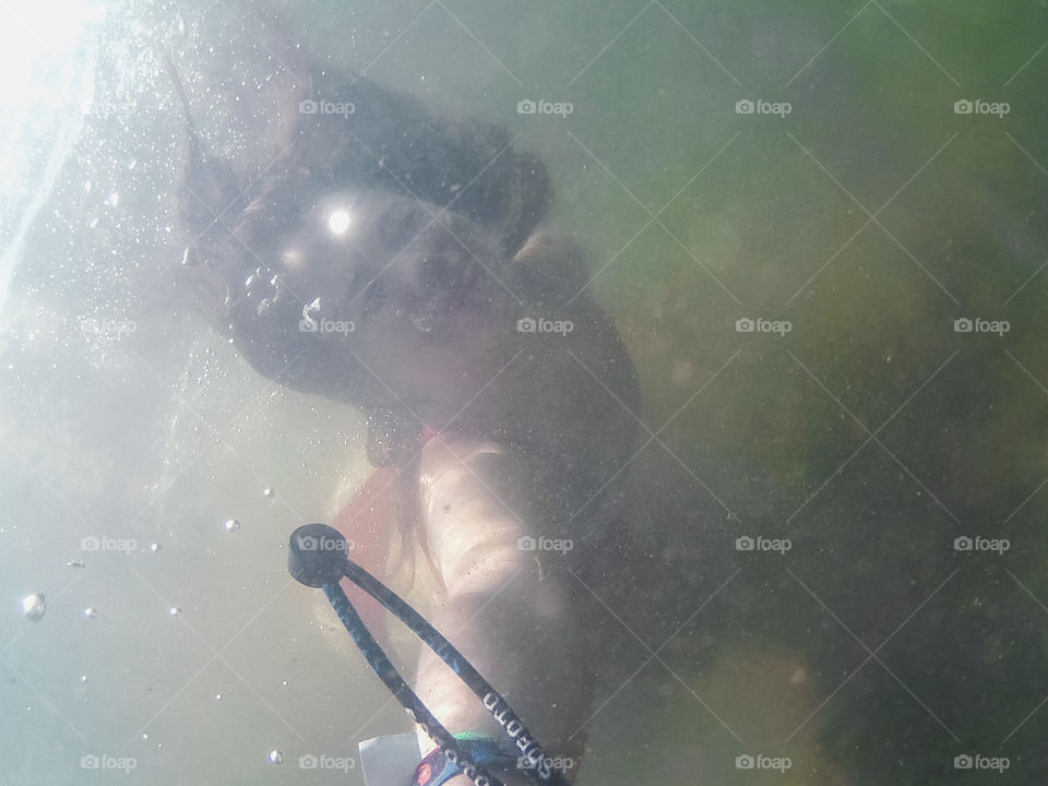 Me under the water while floating down a lazy river in summer