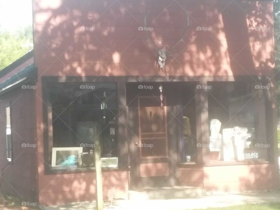 Spillville Iowa little General country store front historic landmark rack