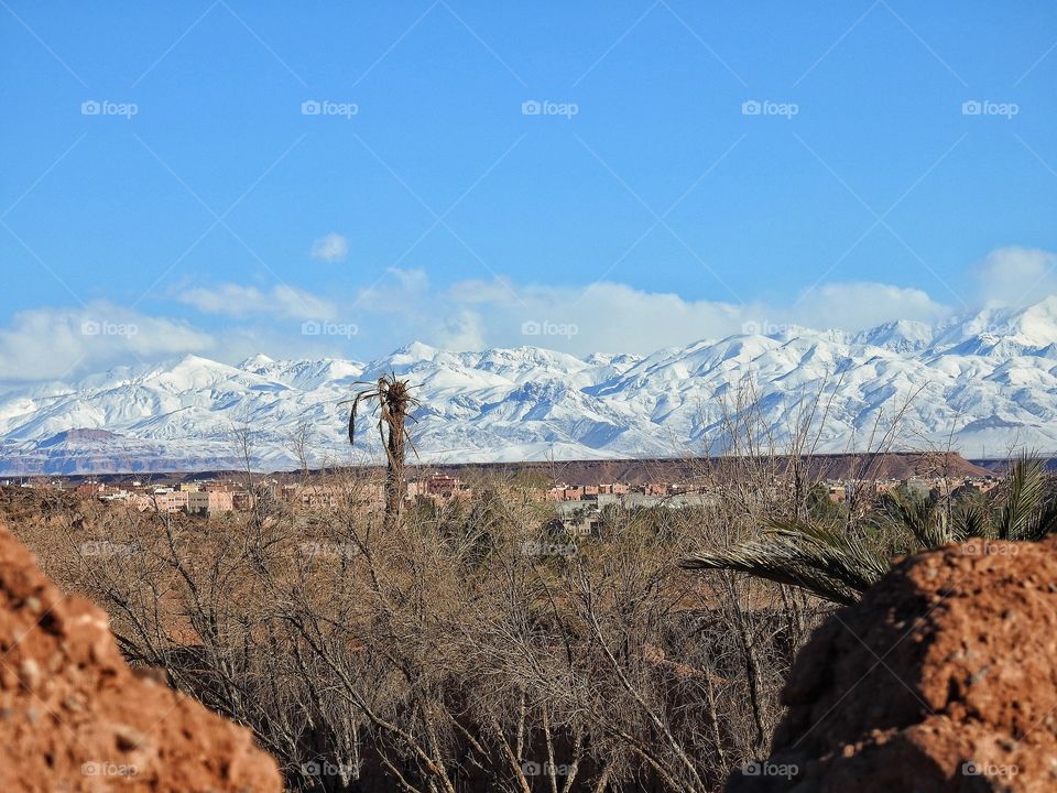 Distant view of snow covered mountain range