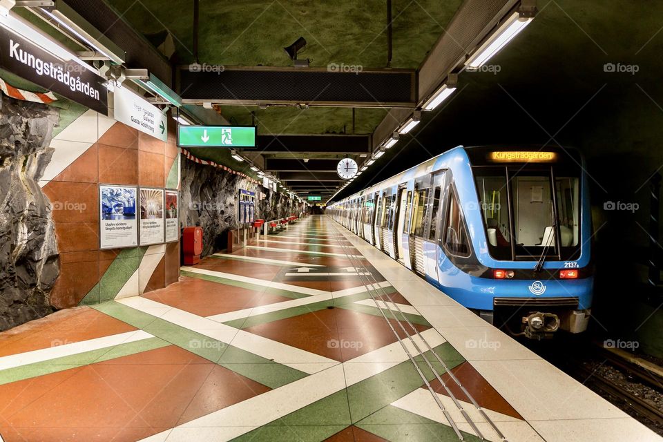 Public transportation, train in a awesome subway station underground in Stockholm Sweden 