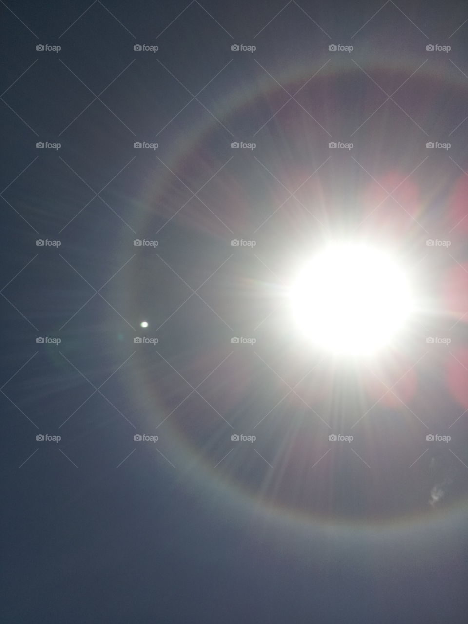 Sun halo seen in Puerto Rico on April 08, 2015 at 12:30 pm.